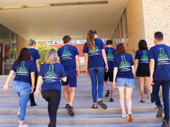 Students walking up Saguaro Hall steps